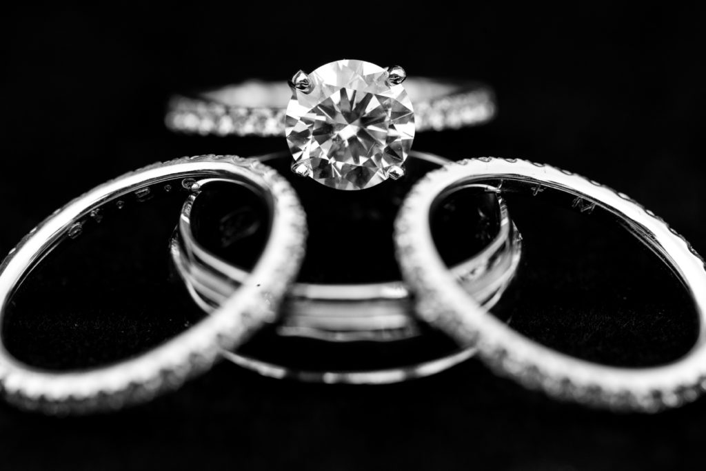 dramatic contrast black and white wedding bands and engagement ring. Photo by Vanessa Joy Photography.