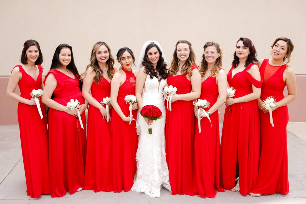 bridesmaids wearing red