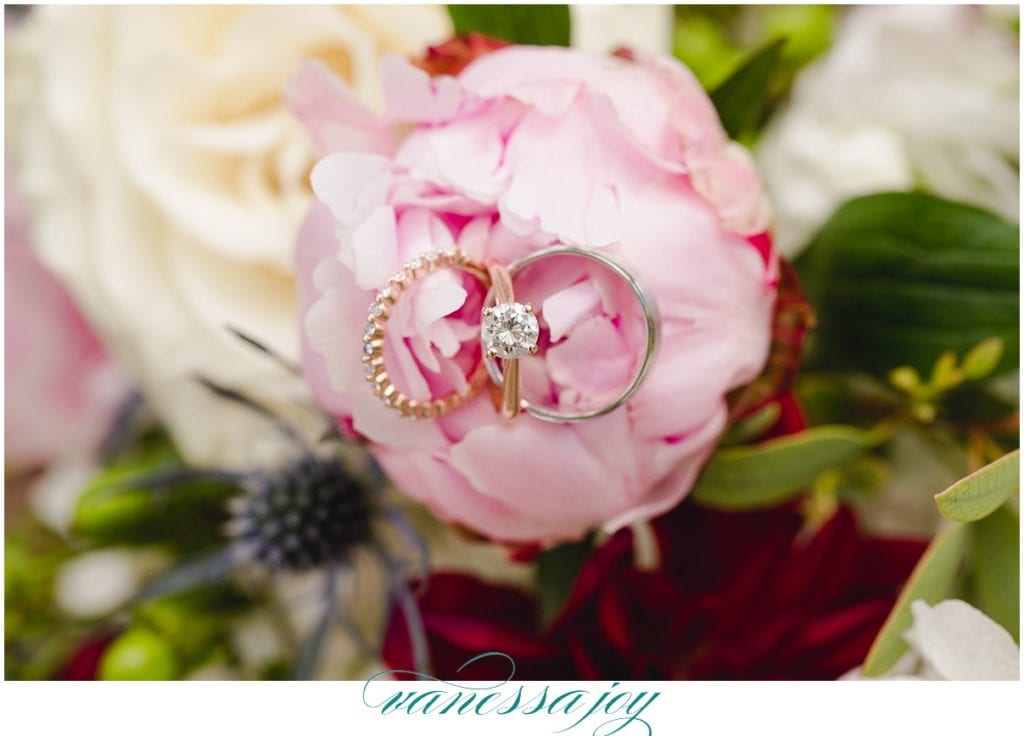 wedding ring photo on floral bouquet