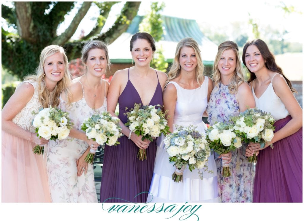 purple and light pink bridesmaids dresses, floral bridesmaids dresses