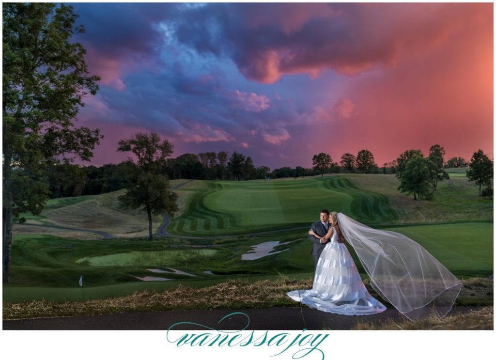 night wedding shot, pink sky, bride and groom, golf course wedding, Hamilton farm wedding, nj luxury wedding