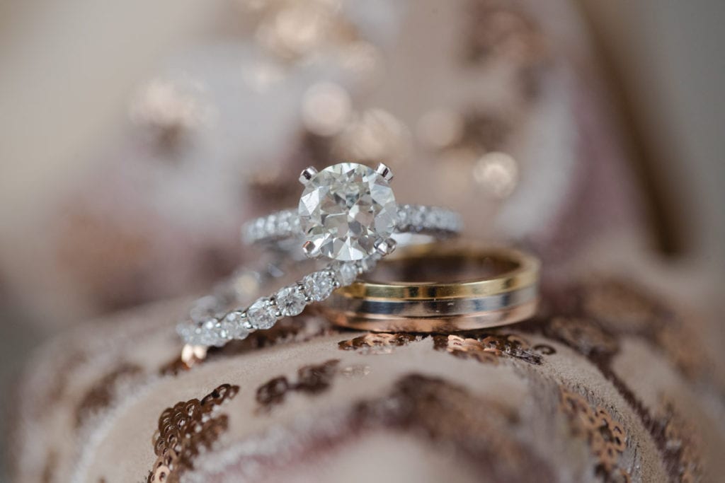 wedding ring detail photo, round cut diamond engagement ring