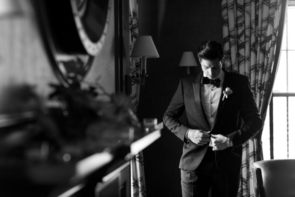 black and white wedding photos, portraits of the groom