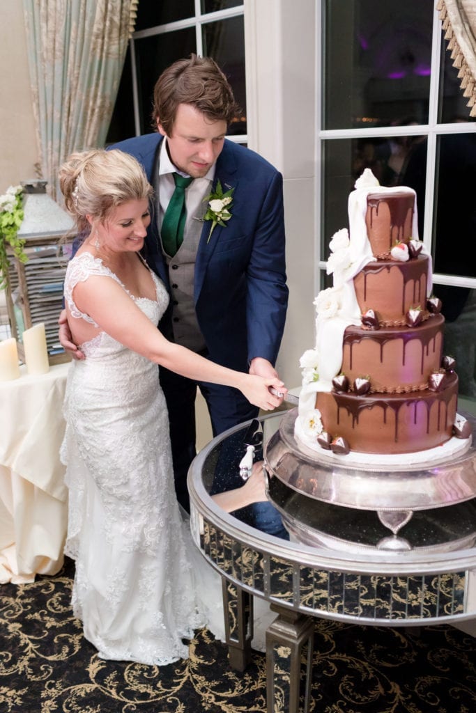 cutting of the cake, chocolate 4 tiered cake