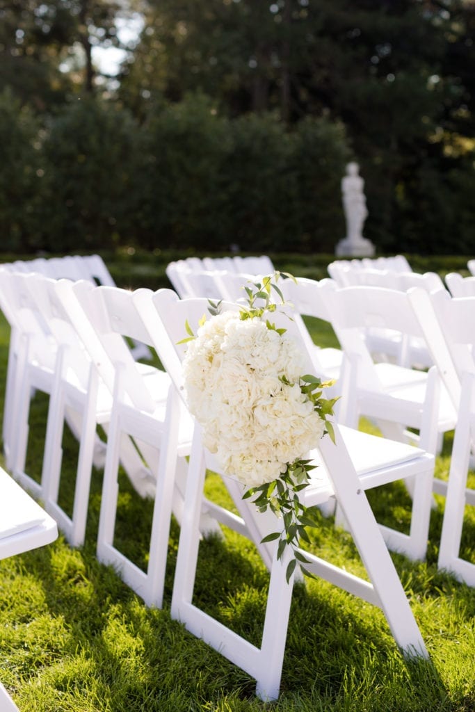 white floral arrangement for wedding ceremony