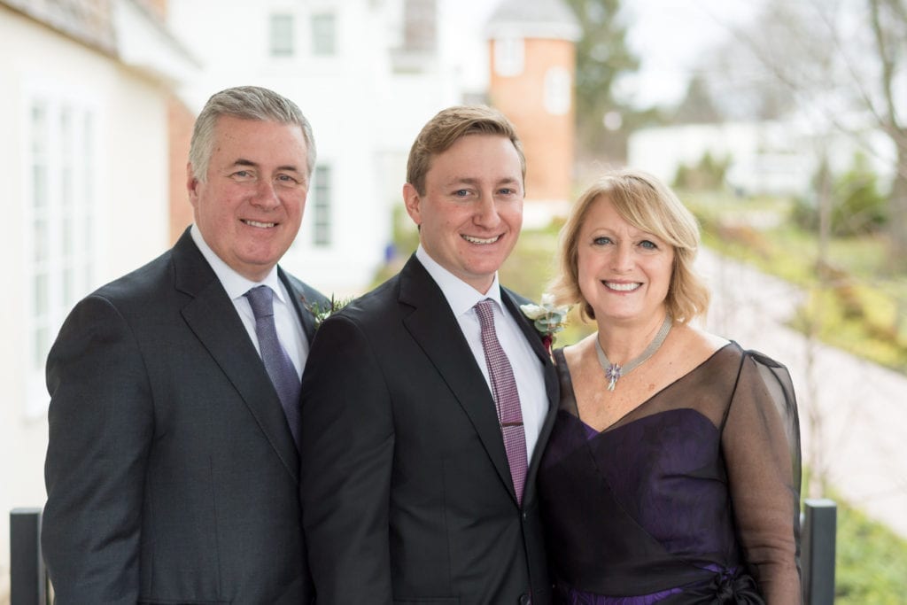 grooms photo with his parents