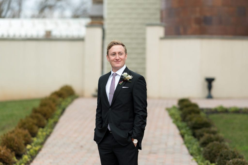 groom in a Peter Millar suit