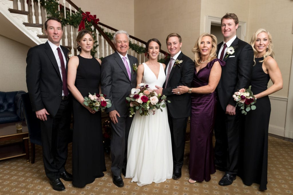 bride and groom with grooms family