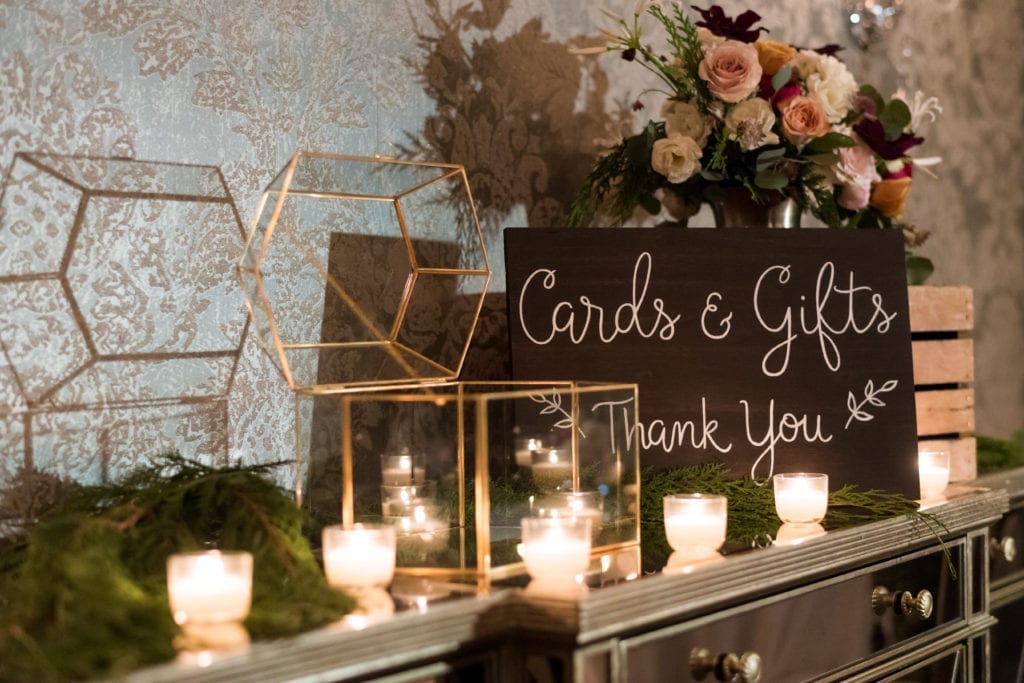 rustic candles at card and gift table