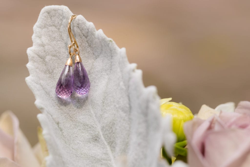 lavender tear drop dangly earrings on florals