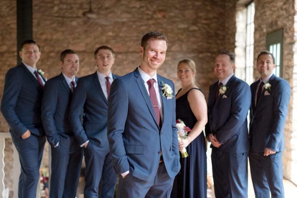 groom with his groomsmen and family