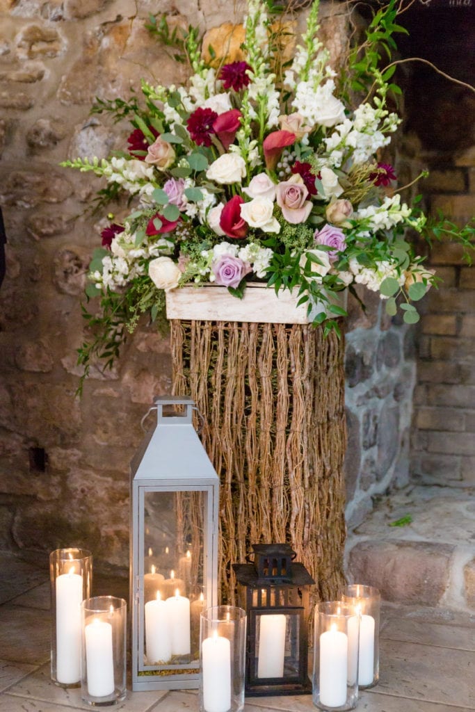 magnificent florals wedding arrangement with candle decor