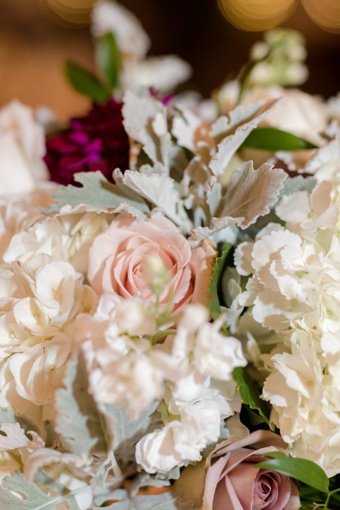 white and pink rose floral arrangement