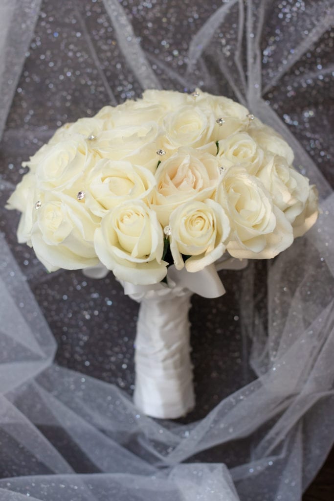 White rose bridal bouquet by flowers by emil with diamond details
