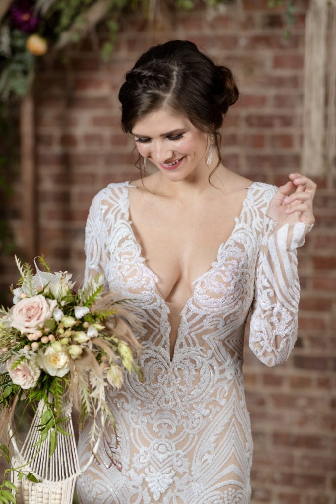 modern day boho bride , deep plunge wedding gown with nude insert