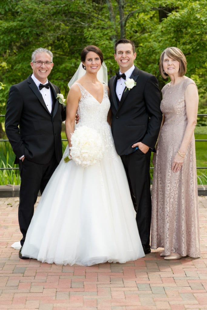 bride and groom with the parents, spring wedding photography