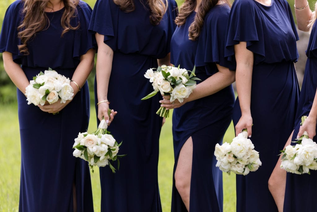 bridesmaids bouquets with white flowers