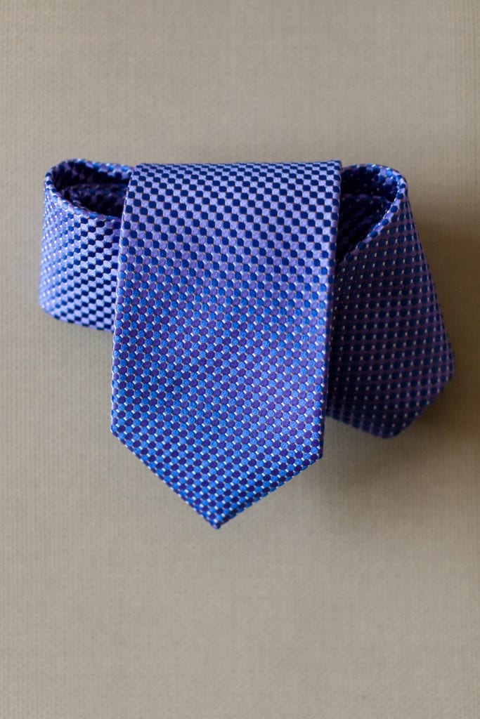 Grooms blue tie detail shot