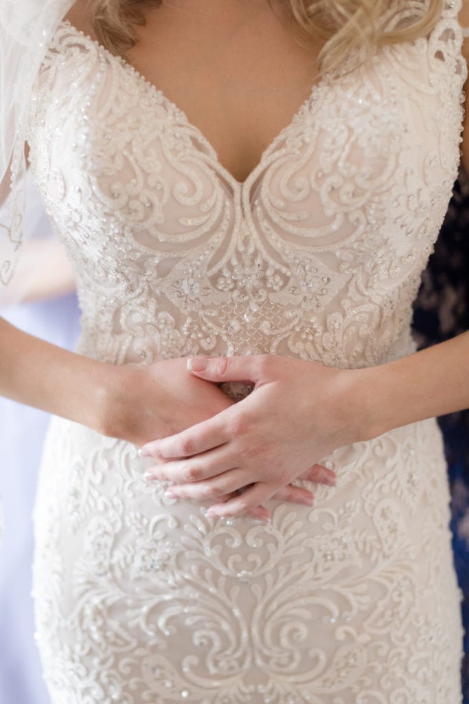 close up of sweetheart cut wedding dress; allure couture bridal 