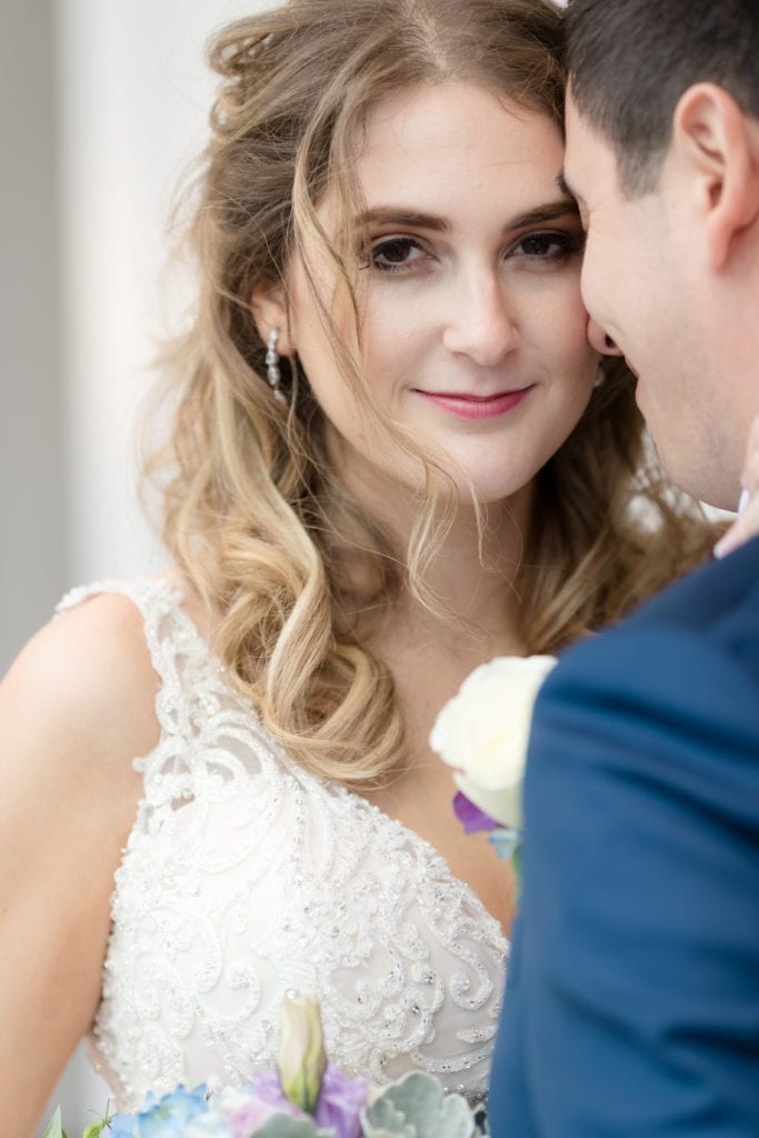 closeup of bride and and groom, salon kokopelli hair