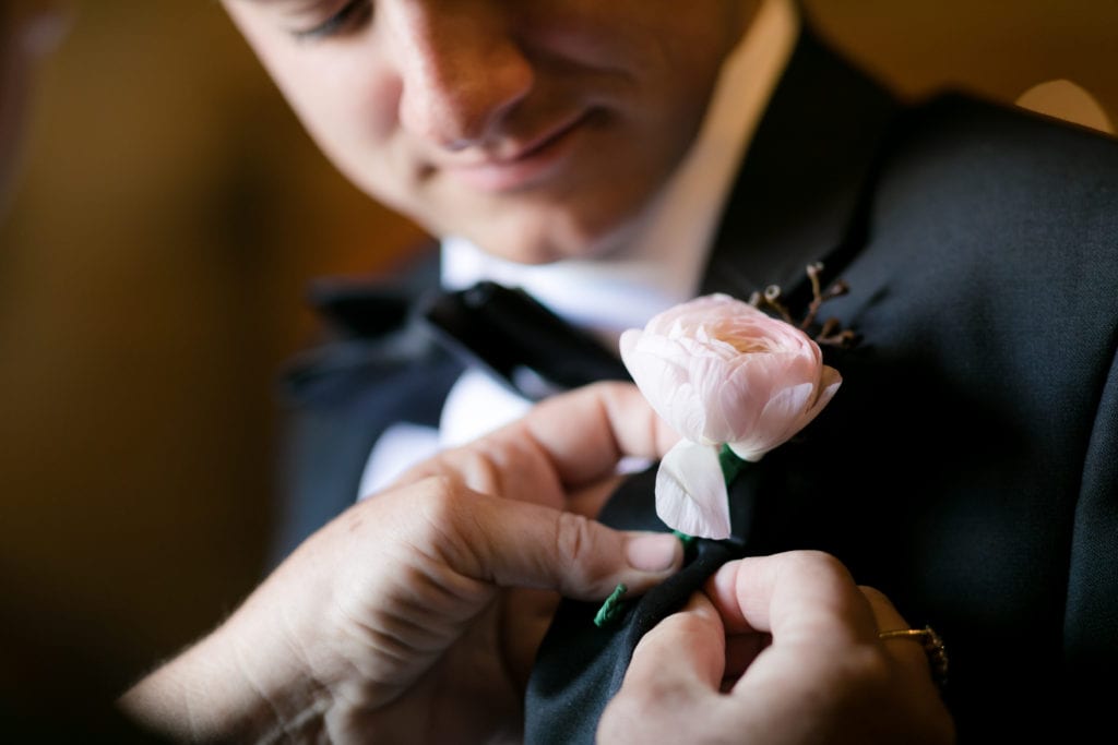 Grooms white boutonniere 