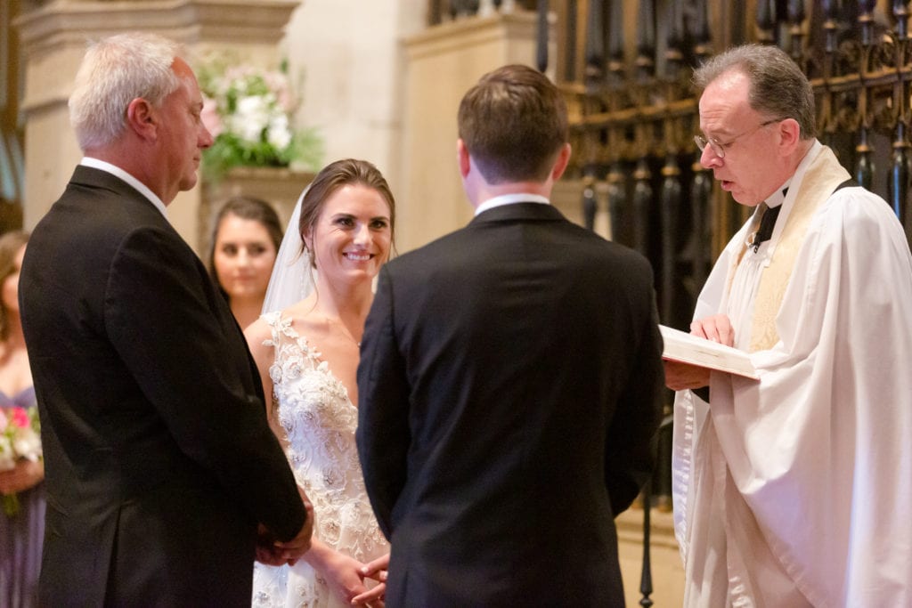 Catholic wedding ceremony, father giving away his daughter
