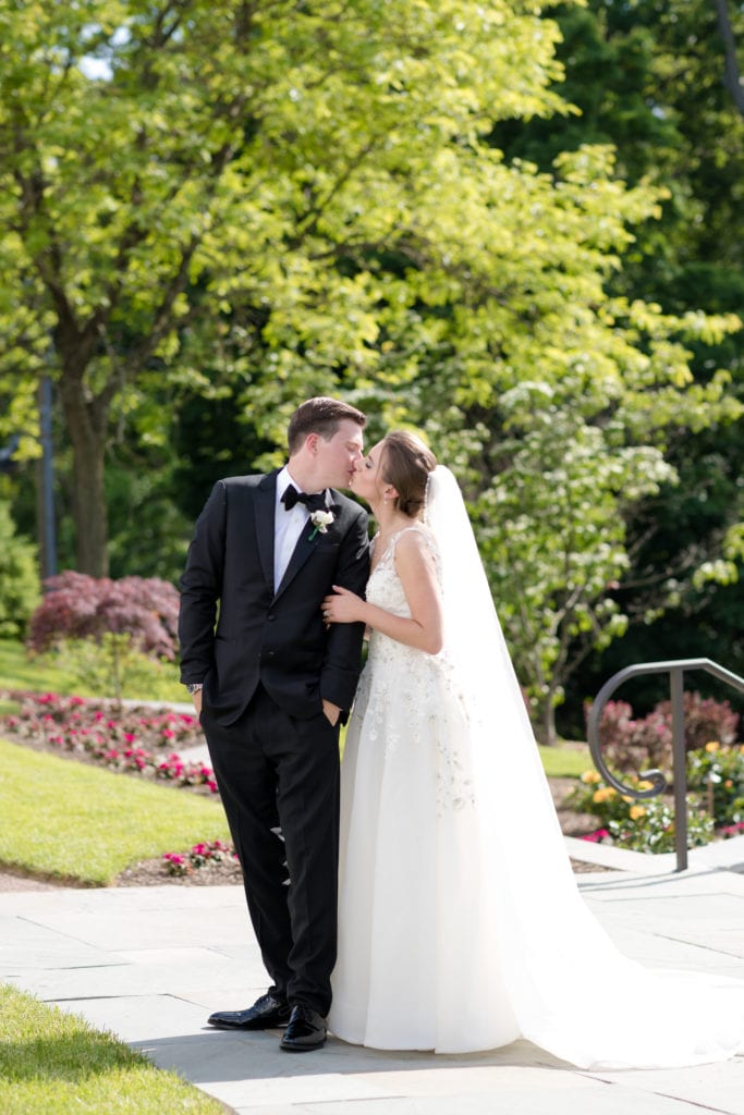 Hackensack Golf Club wedding, bride and groom embrace
