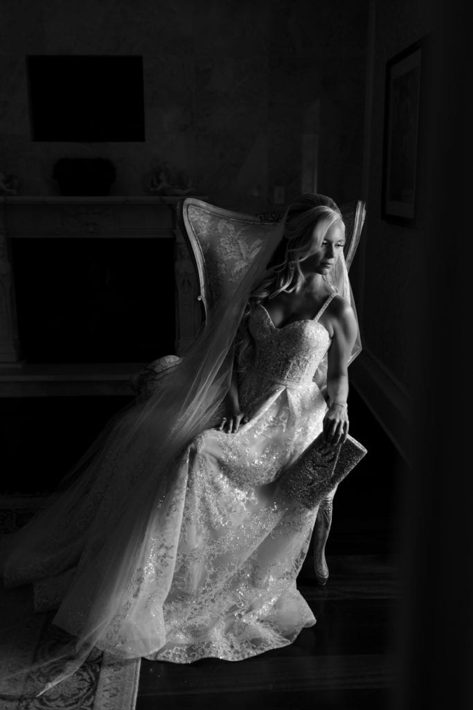 black and white photo of bride, bride in her bridal suite