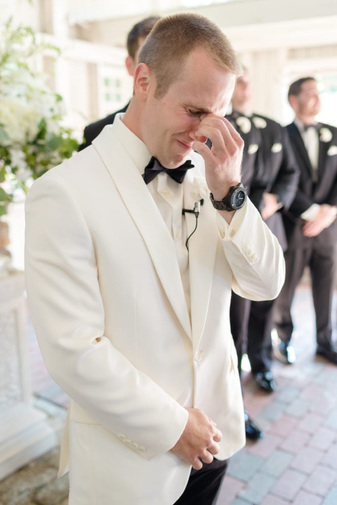 groom crying when seeing his bride