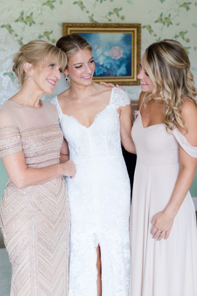 bride laughing with family