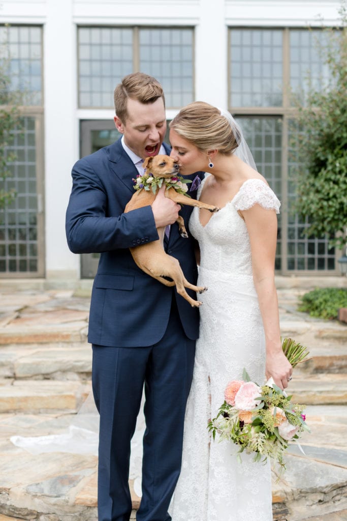 bride and groom with their dog