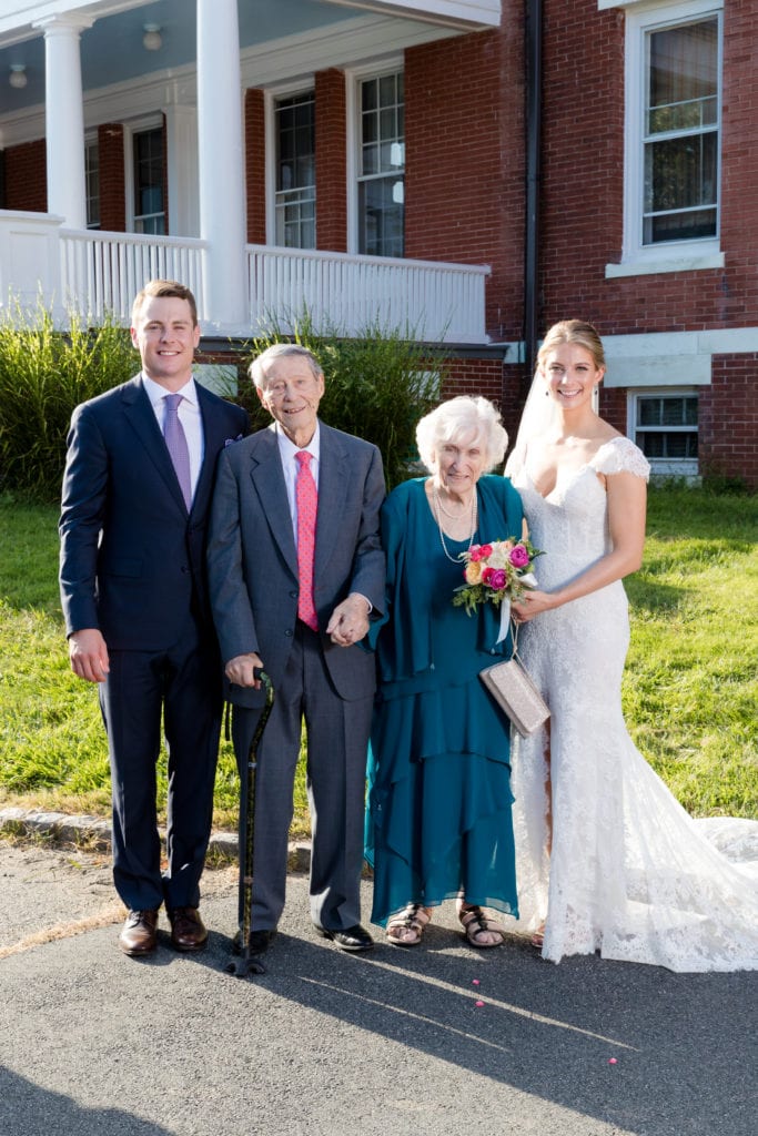 bride and groom with grandparents