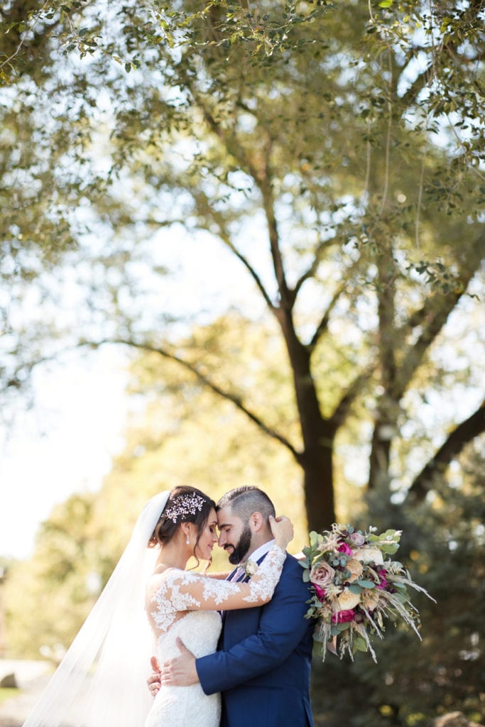 bride and groom hug, outdoor wedding photos