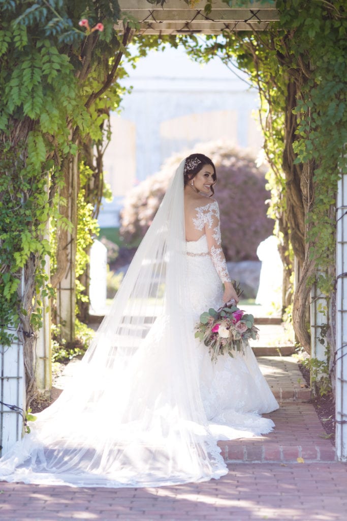 bride walking down archway