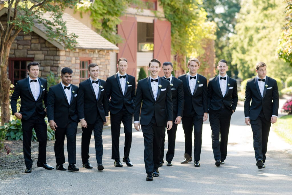 groom and his groomsmen walking, Ozzy's wedding tuxedos