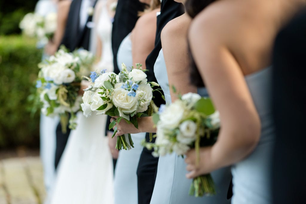bridesmaids with MDS floral arrangements