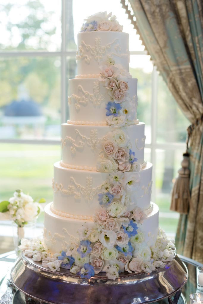 5 tiered The Bake Works wedding cake with pastel florals