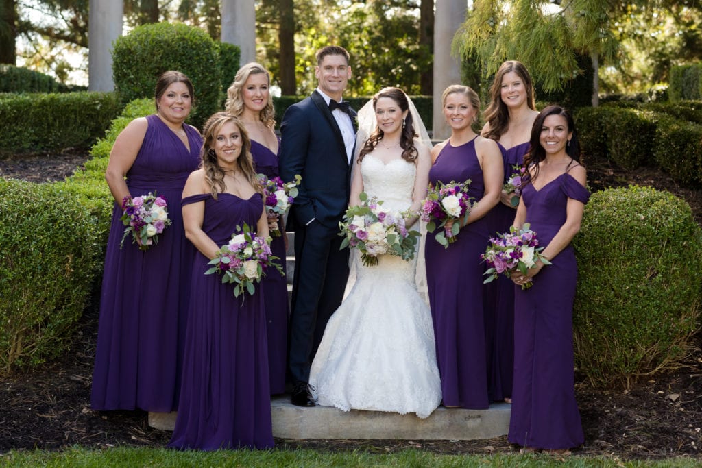bride and groom with the bridesmaids