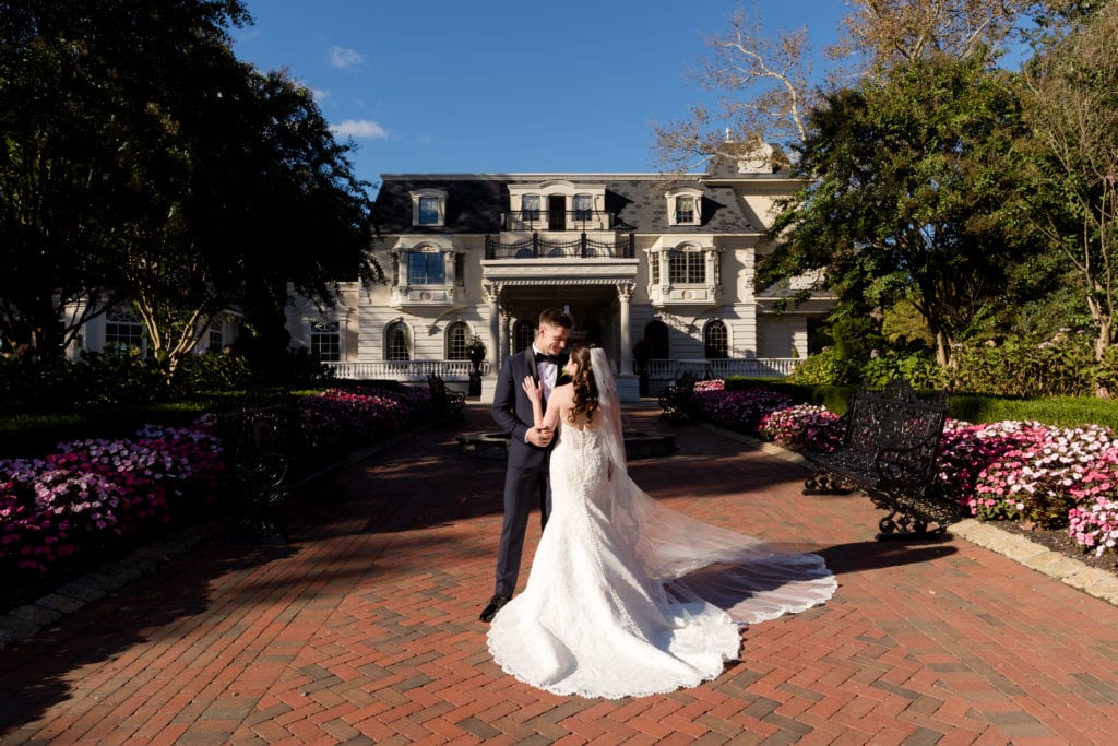 Bride and groom in front of Ashford Estate