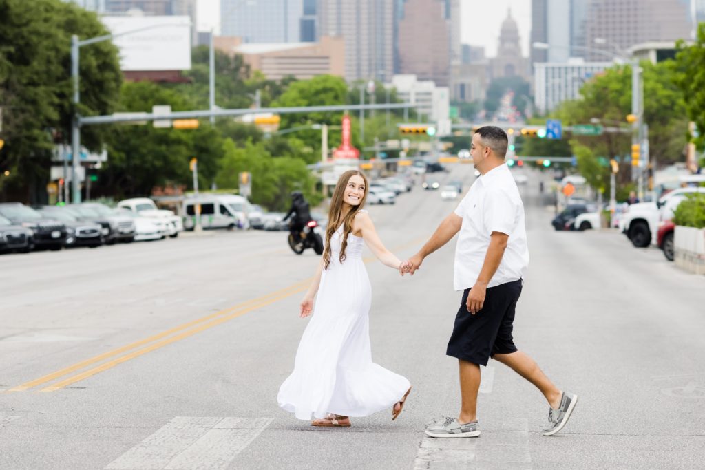 Austin Texas engaged couple crossing the street