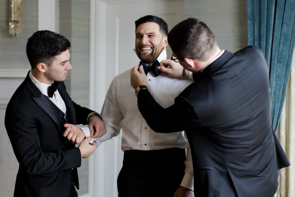 groomsmen help groom get ready, groom's preparations