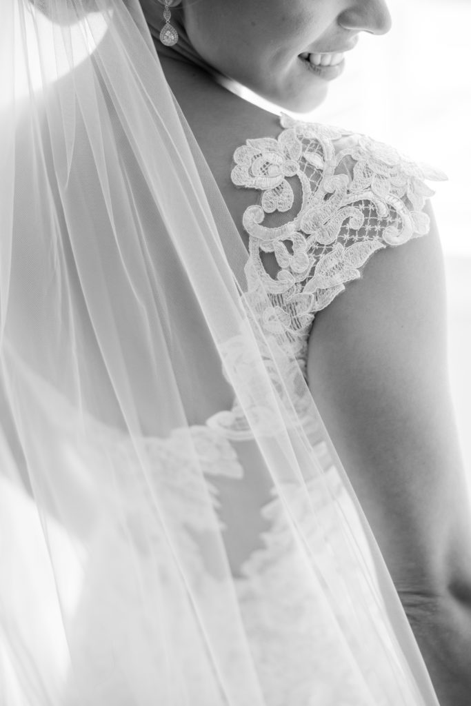 Maggie Sottero Designs wedding dress, bride's veil