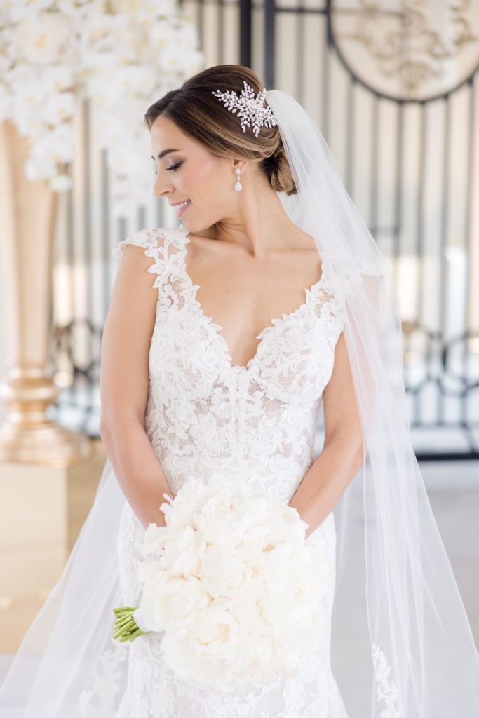 Bride beams bright in Maggie Sottero Designs wedding gown from Kleinfeild Bridal 