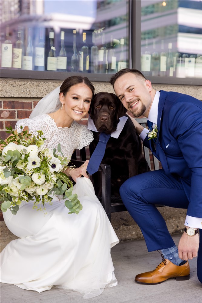 dog parents, bride and groom and dog