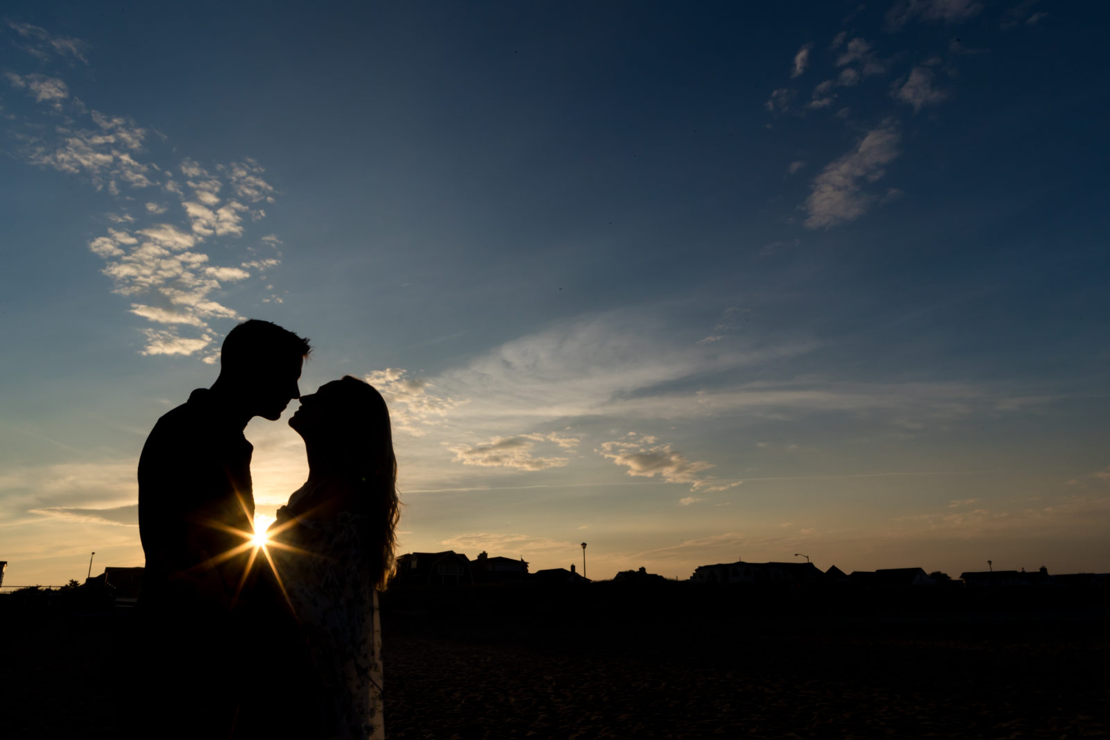 SUNSET GOLDEN HOUR SILHOUETTE BY SPRING LAKE ENGAGEMENT PICTURES